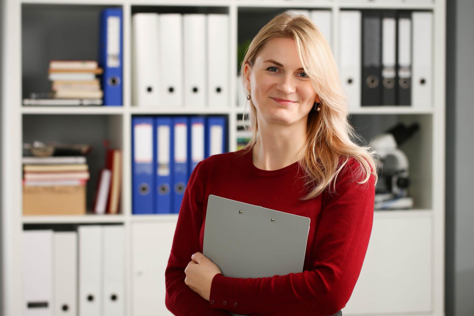 Happy smiling blond businesswoman